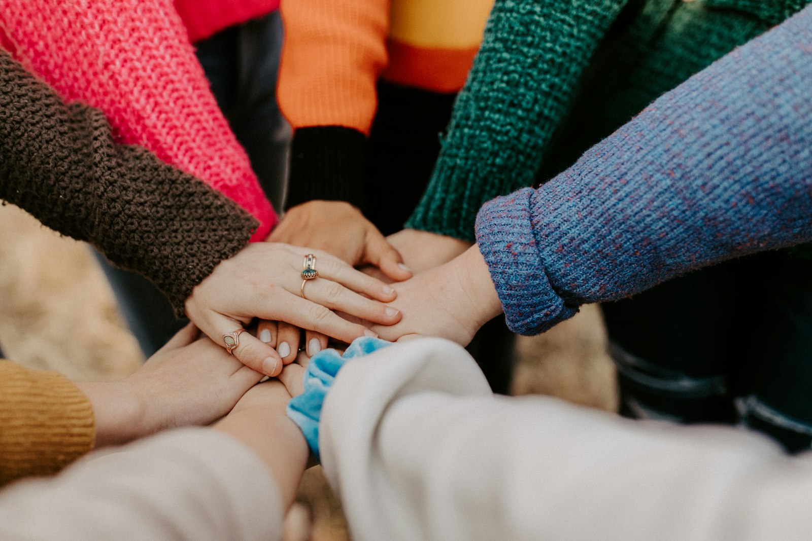 Hands joining together in support
